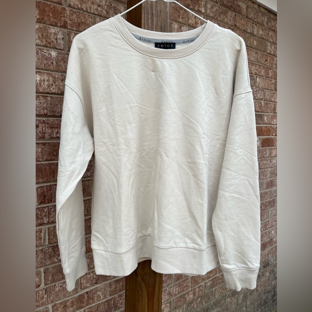 Zelos‎ sweater